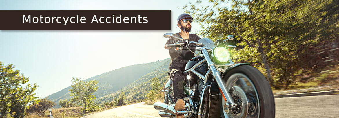 motorcyclist on the road with caption Motorcycle Accidents