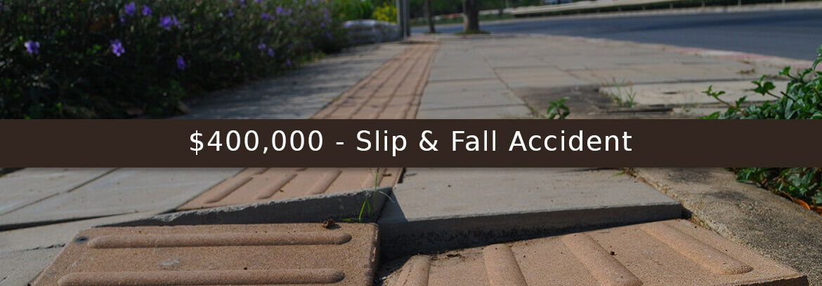 sidewalk uprooted representing slif and fall case